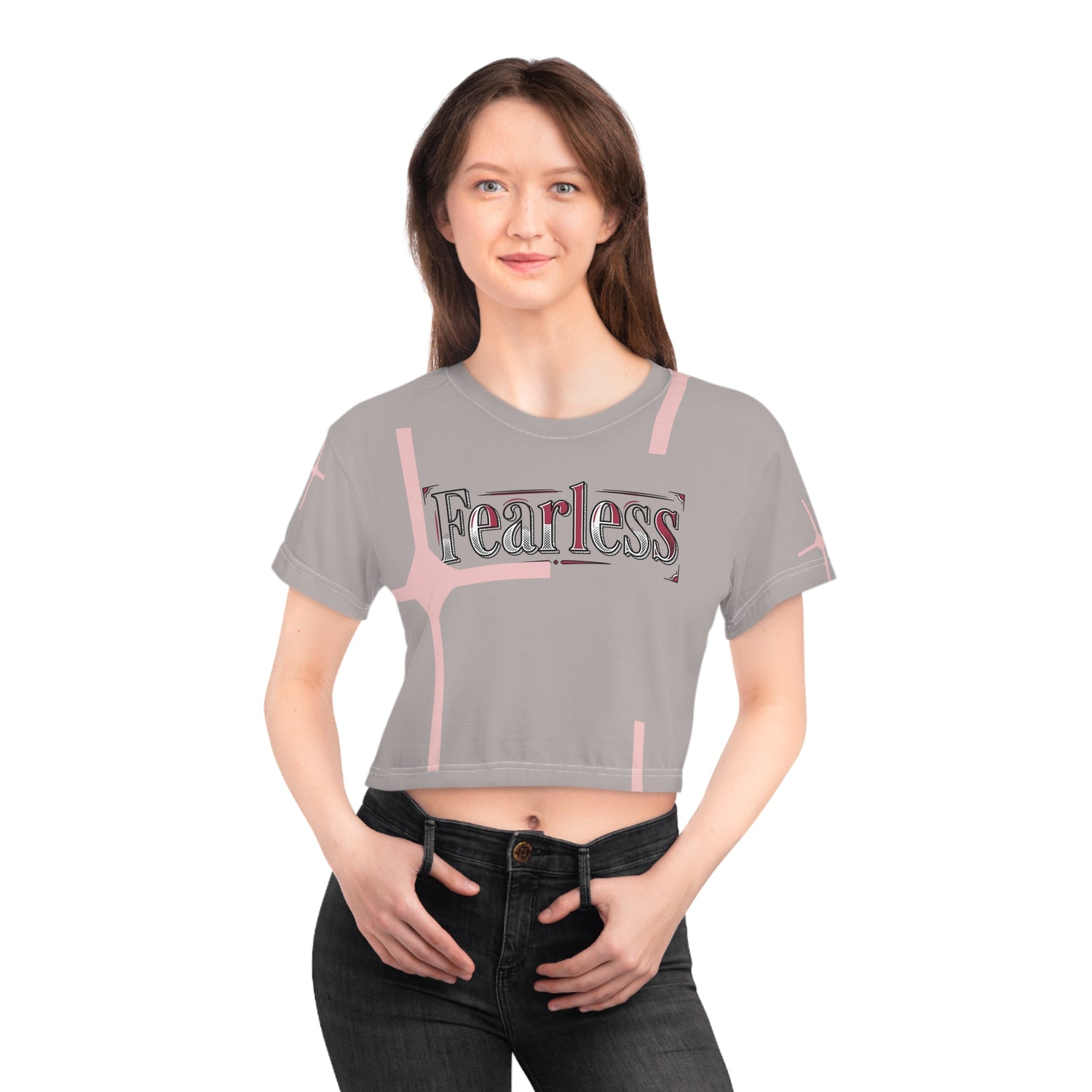 pink cross graphic crop tee for women featuring the word fearless in stylish lettering